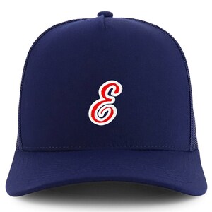 May include: A navy blue trucker hat with a red and white embroidered letter "E" on the front.