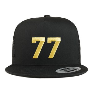 May include: Black trucker hat with a gold embroidered number 77 on the front.