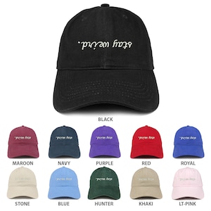 May include: A collection of baseball caps in various colors, each featuring the text "stay weird." in white embroidery. The caps are arranged in a grid, with the color of each cap labeled below it.