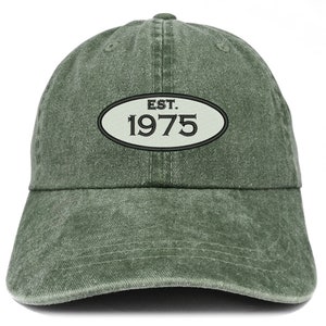 May include: A green, distressed, cotton baseball cap with an oval patch that reads "EST. 1975".