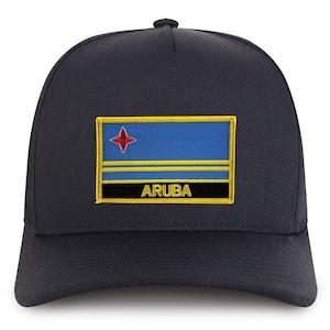 May include: A black baseball cap with a blue, yellow, and red Aruba flag patch on the front. The patch has the word "ARUBA" written in yellow letters.