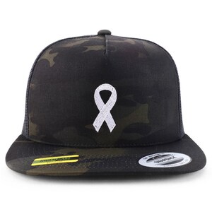 May include: A black and camouflage baseball cap with a white ribbon embroidered on the front. The cap has a curved brim and a mesh back. The brim and front panel feature a camouflage pattern, while the ribbon is a symbol of awareness.