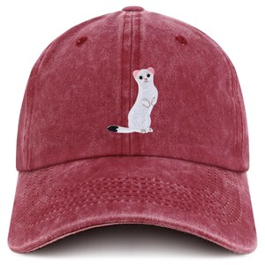 May include: A maroon baseball cap featuring an embroidered white ermine with a black-tipped tail. The cap has a curved brim and an adjustable strap. The ermine is standing upright.