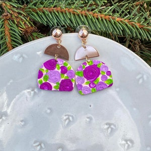 Gold and clay earrings with purple flowers image 1