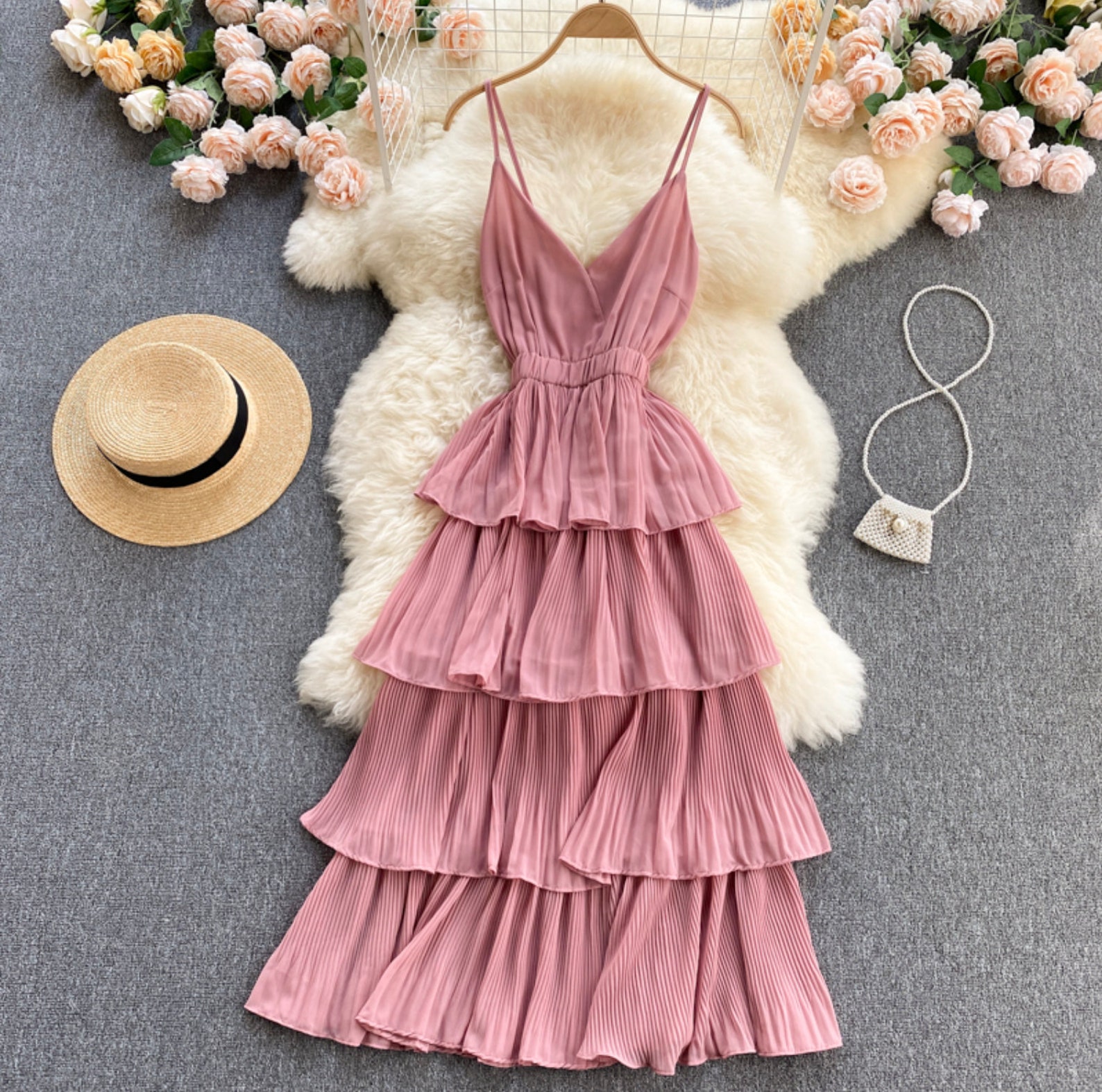 Beach dress with twisted pleats