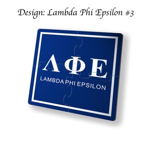 May include: Blue and white jigsaw piece with the Greek letters Lambda Phi Epsilon and the words "Lambda Phi Epsilon" written below.