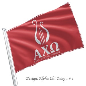 Può includere: Una bandiera rossa con una lira bianca e le lettere "AXO" in bianco. Il testo "REAL. STRONG. WOMEN." è scritto sotto le lettere.