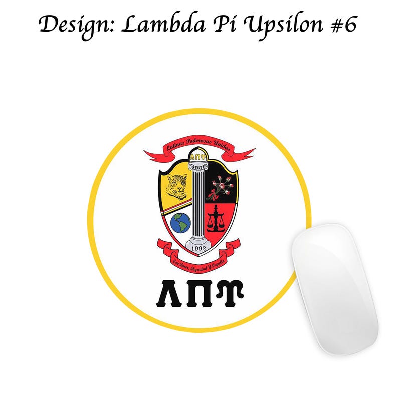 May include: A circular sticker with a yellow border, displaying a crest with a jaguar, globe, scales, and floral designs. The crest is on a white background, with the Greek letters &Lambda;&Pi;&Upsilon; below. The text "Design: Lambda Pi Upsilon #6" is at the top.