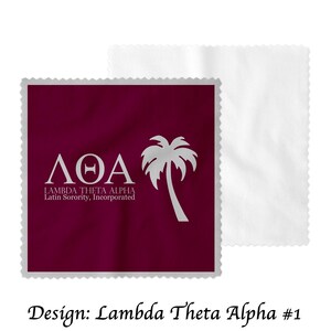 May include: A maroon square with rounded corners and a white border. The square has a white palm tree and the letters "ΛΘΑ" in white. Below the letters is the text "Lambda Theta Alpha Latin Sorority, Incorporated".