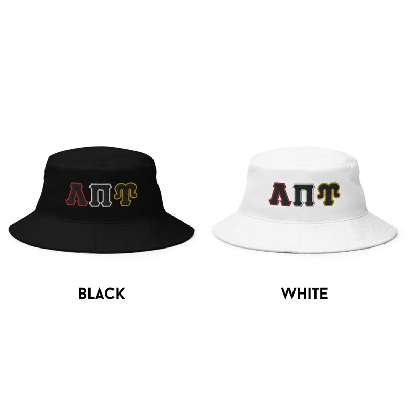 May include: Black and white bucket hats with the letters "A&Pi;&Pi;&Gamma;" in red, gray, and gold. The hats are available in black and white.