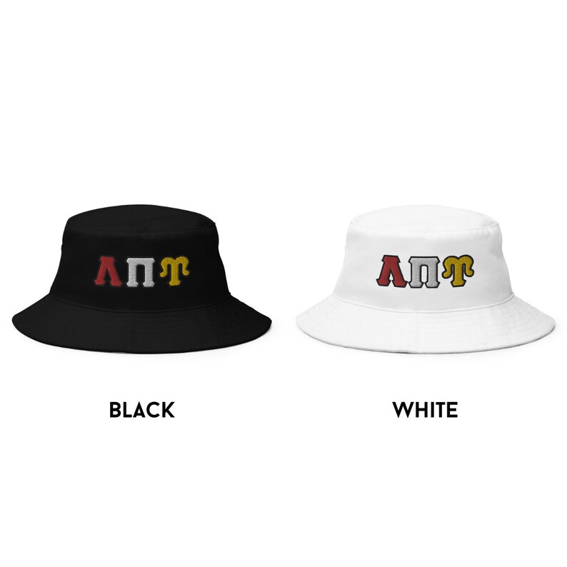 May include: Two bucket hats, one black and one white, with the letters "A&Pi;&Pi;&Gamma;" embroidered in red, white, and gold.