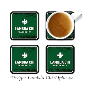 May include: Four green coasters with a white cross and the text "Lambda Chi Fraternity". The coasters are designed to look like distressed wood.