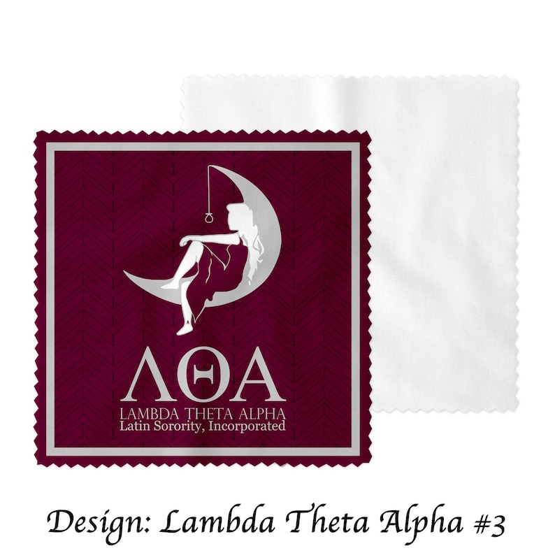 May include: A burgundy square microfiber cleaning cloth with a silver border and a white design of a woman sitting on a crescent moon. The text "&Lambda;&Theta;&Alpha;" is below the moon and the text "LAMBDA THETA ALPHA Latin Sorority, Incorporated" is below that.