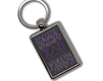 Porte-clés Sigma Lambda Beta métallique