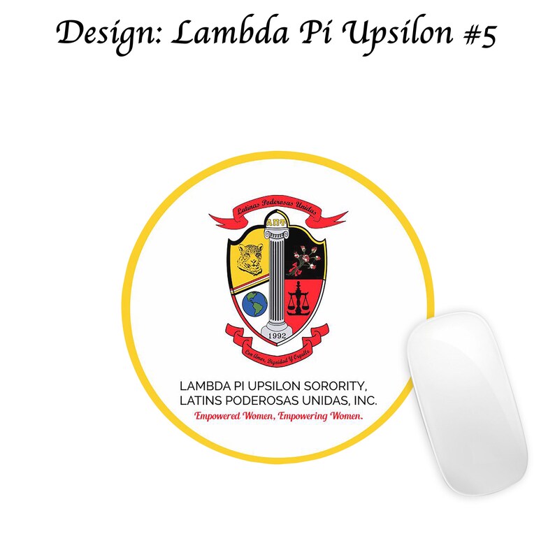 May include: A white computer mouse beside a round yellow sticker with a sorority crest. The crest features a shield with a jaguar, a pillar, and scales. Text includes "Lambda Pi Upsilon Sorority" and "Empowered Women, Empowering Women."