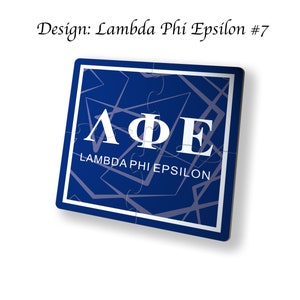 May include: Blue and white puzzle with the Greek letters Lambda Phi Epsilon and the words "Lambda Phi Epsilon" on a blue background with a white border.