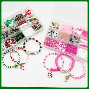 May include: Two clear plastic containers filled with colorful beads, charms, and letters. The containers are next to three bracelets made with the beads. One bracelet has red and white stripes, one has green and white stripes, and one has pink and white stripes.
