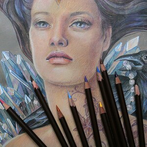 May include: A woman with long, dark hair is drawn in pencil. She has a crown on her head and is wearing a necklace of pearls. A raven is perched on her shoulder. The woman is surrounded by crystals and colored pencils.