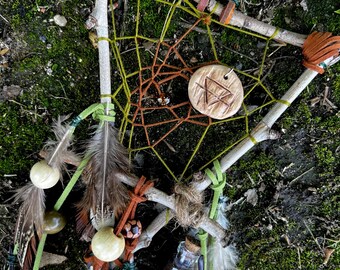 Handmade boho dream catcher earth element spirituality while hanging