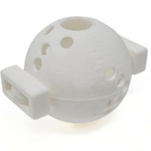 May include: White plastic sphere with multiple holes, attached to a white plastic handle. The sphere has a small hole at the top.