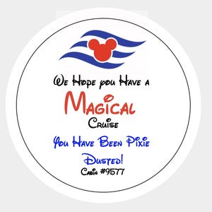 May include: A circular white sticker featuring a red mouse head silhouette above blue wavy lines. The text reads: We Hope you Have a MAGICAL Cruise. You Have Been Pixie Dusted! CABIN #9577. The design uses black, red, and blue lettering on a white background.