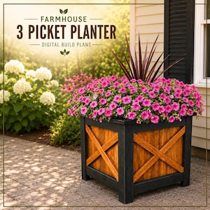 May include: A square wooden planter with a dark black frame and natural brown wood panels featuring an X-shaped design. The planter is filled with vibrant pink flowers and tall, thin, dark-tipped leaves. Text reads: FARMHOUSE 3 PICKET PLANTER.