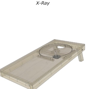 May include: X-Ray image of a wooden cornhole game board with a clear plastic disc in the center. The board has a wooden frame and two legs.