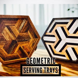 May include: Two hexagonal serving trays with geometric designs. One tray is made of various shades of brown wood, the other has black, white, and natural wood tones. The text "GEOMETRIC SERVING TRAYS" is displayed.
