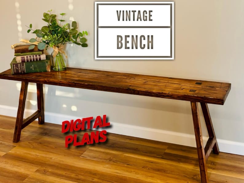 May include: A rustic, wooden bench with a distressed finish. The bench has a rectangular top and angled legs. The words "VINTAGE BENCH" are displayed above the bench. The words "DIGITAL PLANS" are displayed in red below the bench.