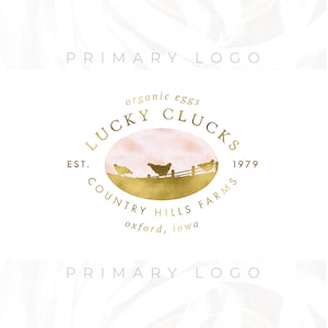 May include: A gold logo on a white background with a pink watercolor circle. The logo says 