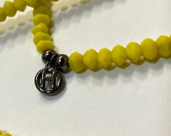 N.Humility Chain Yellow Oval 6x4 Faceted Bead
