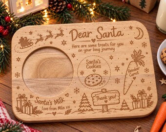 以下が含まれることがあります： Dear Santa、Here are some treats for you on your long journey、Santa's Cookies、Reindeer Carrot、Santa's Milk、Thank you、Love from Mila xxという文字とクリスマスのデザインがレーザー刻印された長方形の木製サービングボード。