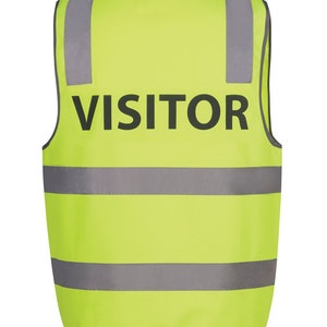 May include: A bright yellow safety vest with reflective silver stripes and the word "VISITOR" printed in black.