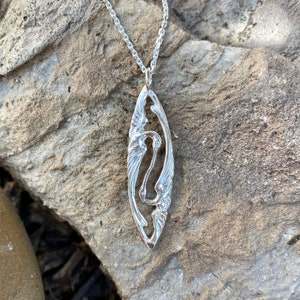 Elegant Yin-Yang Interlocking Bird Pendant