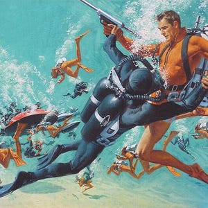 May include: A group of divers in a blue underwater scene. One diver is wearing an orange wetsuit and holding a gun. Another diver is wearing a black wetsuit and is being held by the diver in the orange wetsuit. The divers are surrounded by other divers and bubbles.