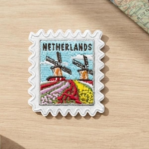 Toppa da viaggio Paesi Bassi – 2 x 2 cm, souvenir europeo da applicare con il ferro da stiro