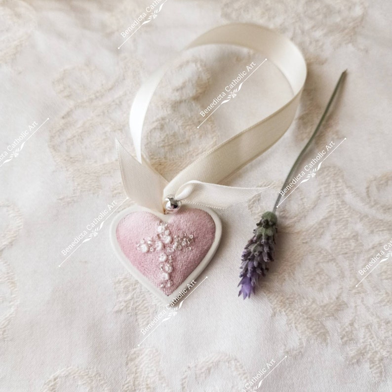 Protection for babies. Little crib medal hand embroidered