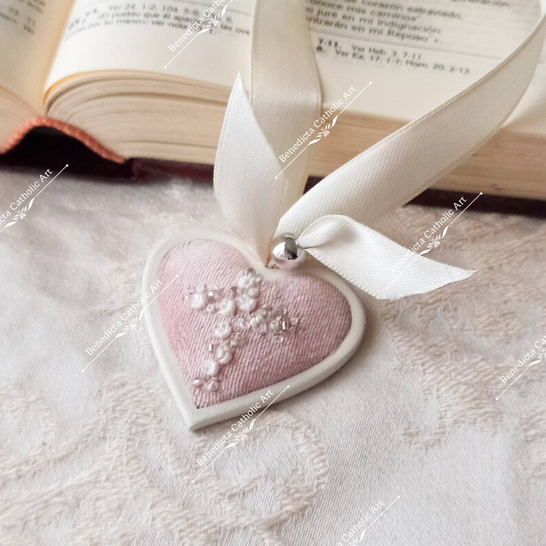 Protection for babies. Little crib medal hand embroidered