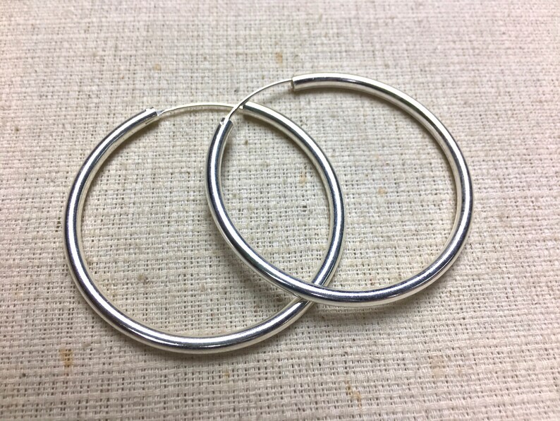 silver 50mm hoop earrings