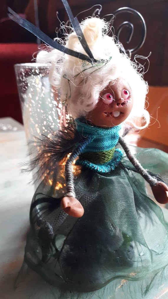 creepy elf doll