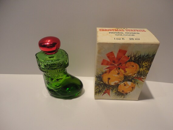 Avon Christmas Surprise Perfume Bottle Avon perfume glass bottle with red cap
