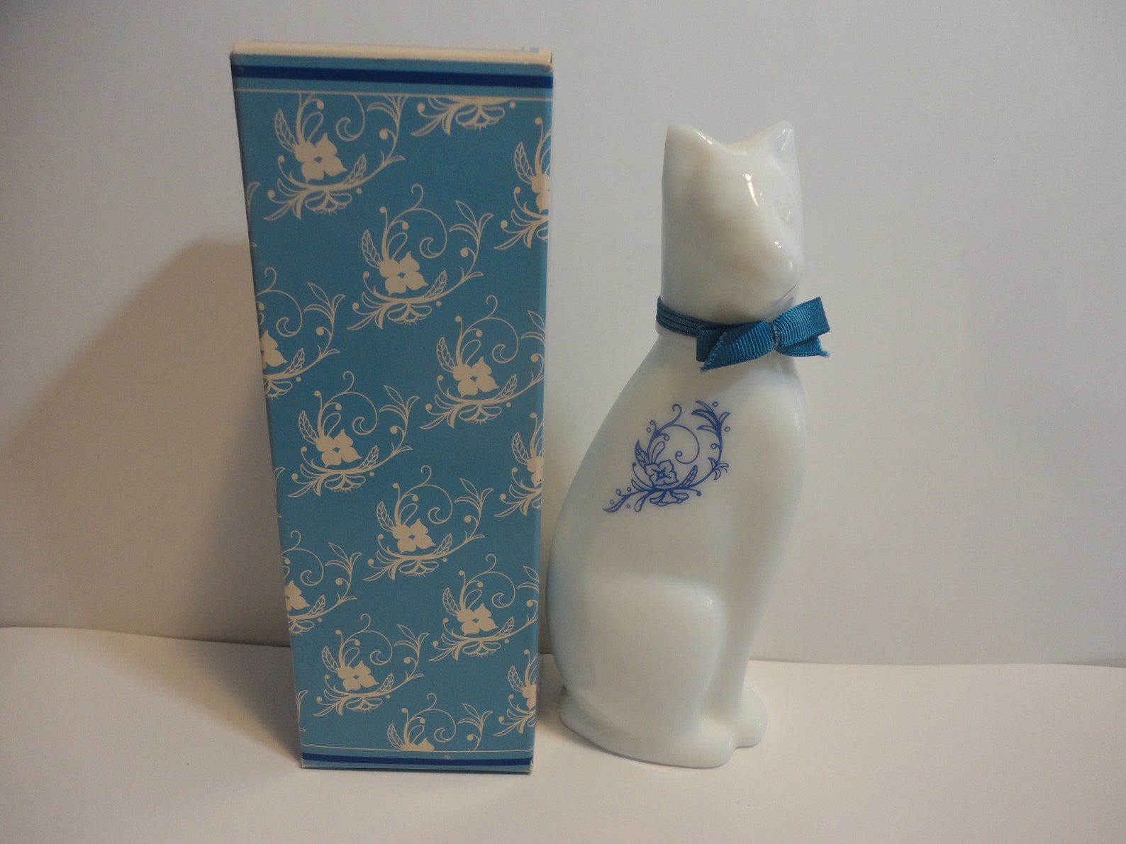 Avon white cat perfume bottle