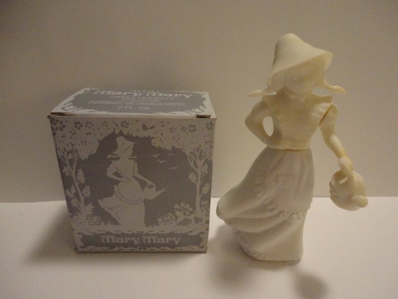 Avon Mary Mary perfume bottle and sweet Avon Peek A Mouse Sweet Honesty Cologne