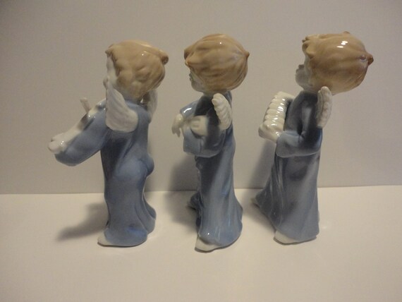 Trio of Blue and White Angels Playing Instruments Made in Japan