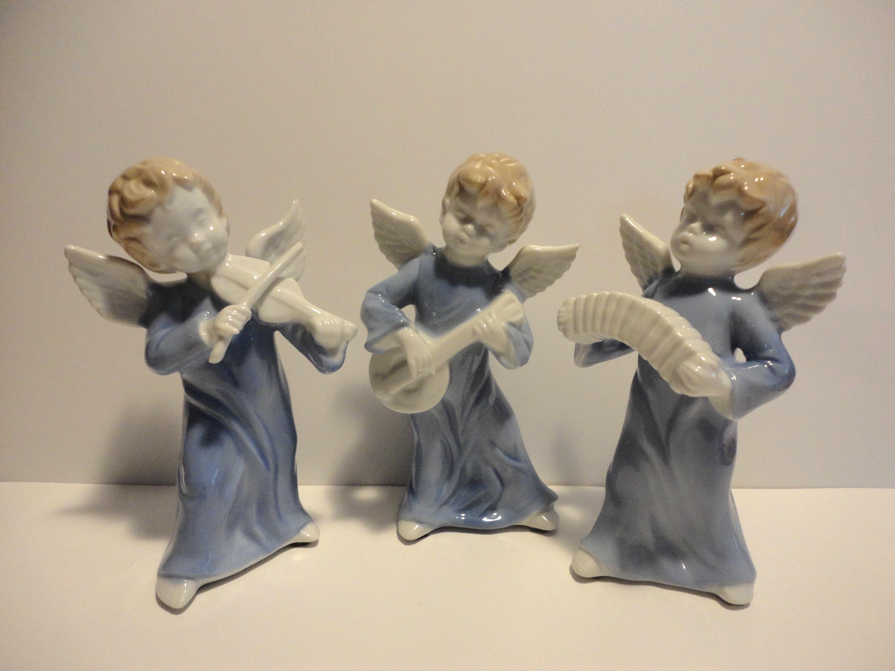 Trio of Blue and White Angels Playing Instruments Made in Japan