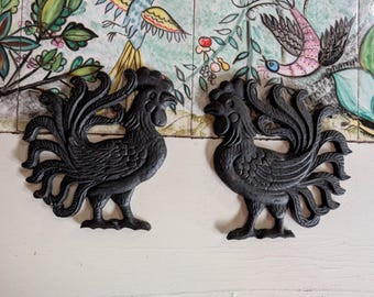 Vintage cast iron trivets in the shape of roosters - set of 2