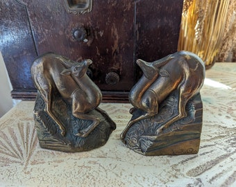 Art Deco antler signed '29 hand painted metal bookends pair
