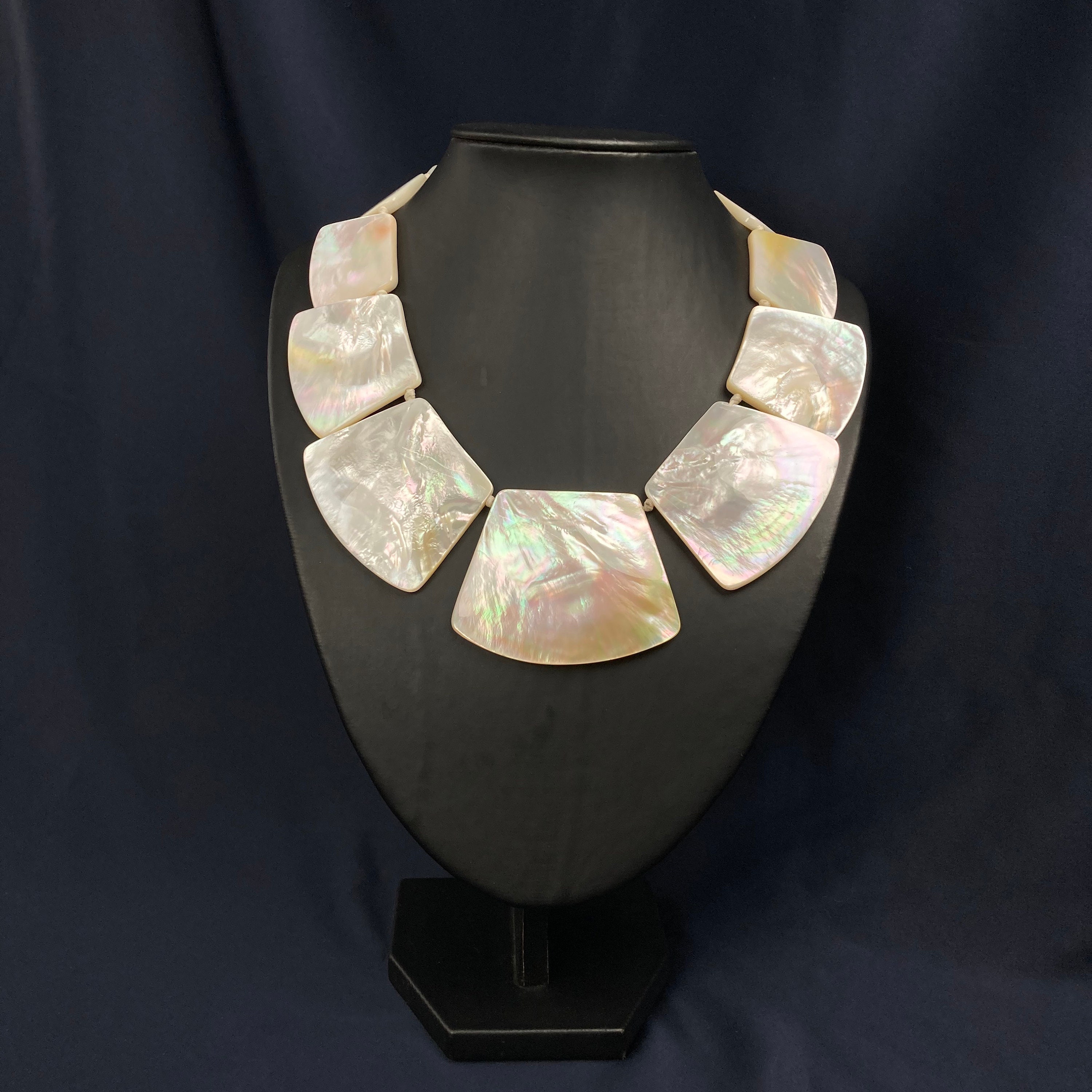 Mother of pearl necklace value best sale