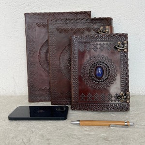 Showcase the journal size and portability with a visual of it being compared. Gift, travelogue, artist, painter, writer, students. practical stylish minimalist bohemian vintage diary logbook antique personalised luxury  experience.
