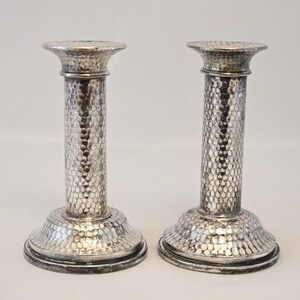 Pair of arts & crafts deco hammered silver plate candlesticks, james dixon c1910